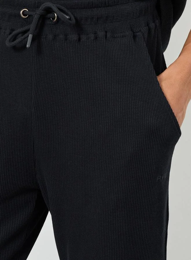 Styli Men Black Waffle Knit Slim Fit Joggers